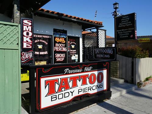 Precious Slut Tattoo Isla Vista  * TATTOOING & PIERCING